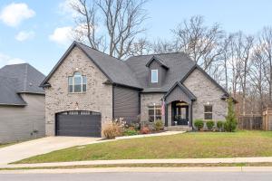 a brick house with a black roof at The Clubhouse 2296 Colston Dr in Clarksville