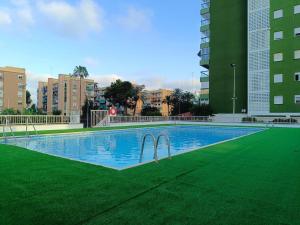Bazén v ubytování Apartamento playa nebo v jeho okolí