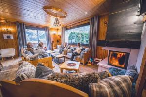 Posezení v ubytování Chalet Hôtel Les Airelles