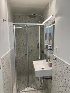 Koupelna v ubytování Hermes Central Suite