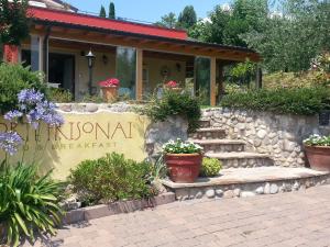 Zahrada ubytování B&B Corte Frisonai