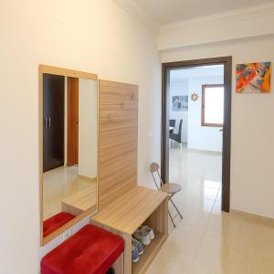 TV a/nebo společenská místnost v ubytování Olymp SkyView Apartment + 23 fotografií