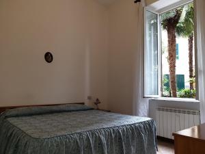 Postel nebo postele na pokoji v ubytování Sabini Rentals - Affittacamere