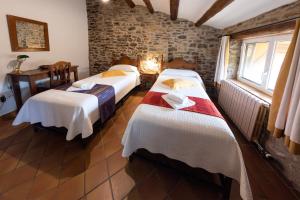 Postel nebo postele na pokoji v ubytování Casa Rural La Choca