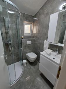 Koupelna v ubytování Apartment Ivkica