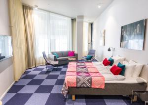 Postel nebo postele na pokoji v ubytování Bo Hotel