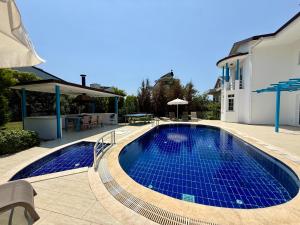 Φωτογραφία από το άλμπουμ του Villa Fergana - Oludeniz σε Ahatli