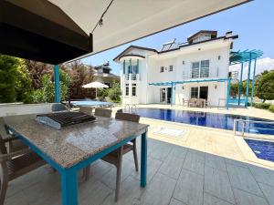 Φωτογραφία από το άλμπουμ του Villa Fergana - Oludeniz σε Ahatli