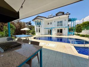 Φωτογραφία από το άλμπουμ του Villa Fergana - Oludeniz σε Ahatli