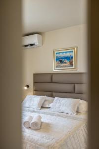 Ένα ή περισσότερα κρεβάτια σε δωμάτιο στο Guesthouse Rooms Split