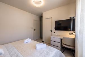 Ένα ή περισσότερα κρεβάτια σε δωμάτιο στο Guesthouse Rooms Split