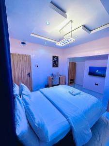 Hotel AREX 객실 침대