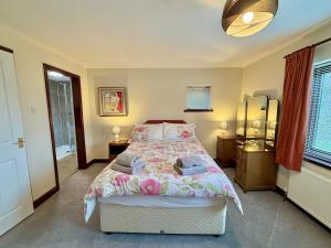 Ένα ή περισσότερα κρεβάτια σε δωμάτιο στο 3 bed house in central Newark