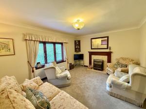 Μια τηλεόραση ή/και κέντρο ψυχαγωγίας στο 3 bed house in central Newark