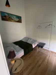 Katil atau katil-katil dalam bilik di Domek letniskowy Iwo