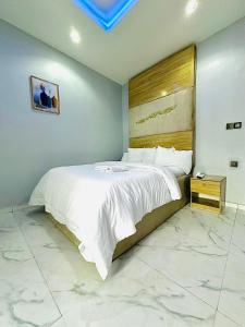 Postel nebo postele na pokoji v ubytování Hotel AREX