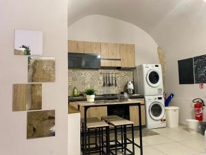 Kuchyňa alebo kuchynka v ubytovaní Cozy apartment near Palermo Cathedral