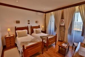 Uma cama ou camas num quarto em Quinta de CasalMato