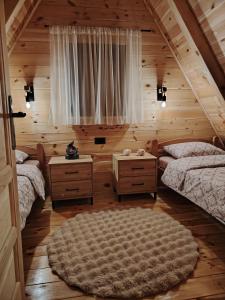 A bed or beds in a room at Durmitor sky