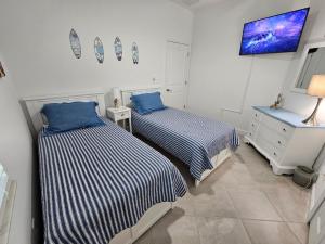 Ein Bett oder Betten in einem Zimmer der Unterkunft Close to Englewood and Boca Grande beach, monthly New Vacation Villa