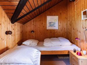 Postel nebo postele na pokoji v ubytování 8 person holiday home in Løgstør-By Traum