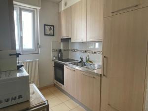 Η κουζίνα ή μικρή κουζίνα στο Appartement clame 6 minutes de la gare de Lausanne