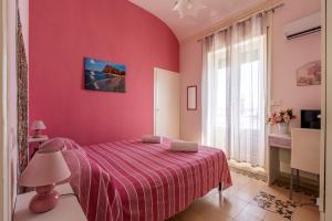 Postel nebo postele na pokoji v ubytování The Twins Rooms in Trapani 2