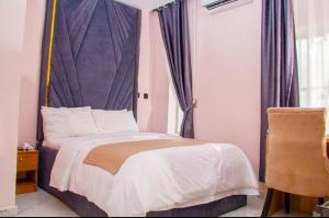 Hotel AREX 객실 침대