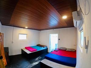 Postel nebo postele na pokoji v ubytování Delft Village Stay
