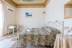 Postel nebo postele na pokoji v ubytování The Twins Rooms in Trapani 2