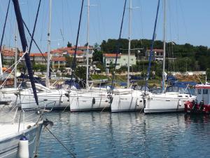 a group of boats docked in a harbor at Apartments Karmen Pula in Pula