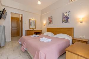Aristotelis Hotel客房内的一张或多张床位