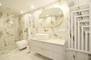 Bilik mandi di Perła Mórz Apartament 75 +26 gambar