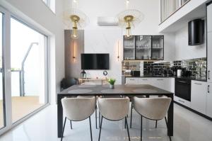 Dapur atau dapur kecil di Perła Mórz Apartament 75