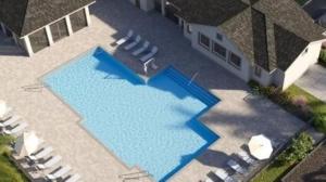 eine Draufsicht auf einen Swimmingpool vor einem Haus in der Unterkunft Close to Englewood and Boca Grande beach, monthly New Vacation Villa in Englewood