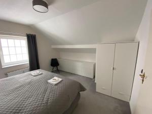 Postel nebo postele na pokoji v ubytování LivingSpace Messe Essen + 6 fotografií