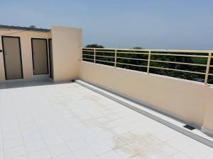 an empty balcony of a building with a view at Vasavi Palace Residency in Pennāttūr