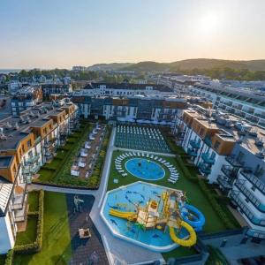 an aerial view of a water park in a city at Belmare Bursztynowy Zakątek in Międzyzdroje