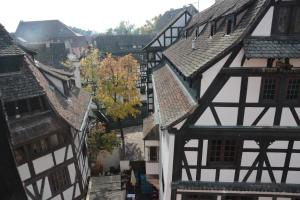 an overhead view of a city with buildings at Le Lohkäs - LOFT Triplex Ultra Design Petite France in Strasbourg