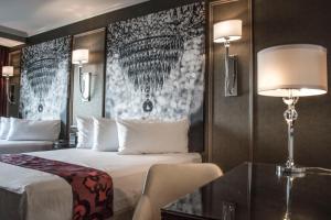 Krevet ili kreveti u jedinici u okviru objekta The Delavan Hotel