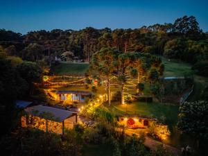 an aerial view of a garden at night at Toca da Araucária - Condado de Prata in Nova Prata