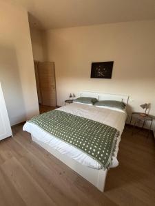 Postel nebo postele na pokoji v ubytování Villa Pieri Appartamento Blu