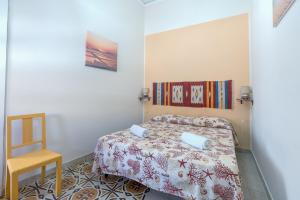 Postel nebo postele na pokoji v ubytování The twins Rooms in Trapani 1