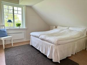 Postel nebo postele na pokoji v ubytování Sörbygården Bed & Breakfast