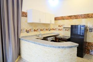 A kitchen or kitchenette at Tomorrow Land villa Még 21 kép