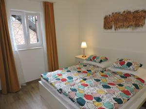 Posteľ alebo postele v izbe v ubytovaní Apartments Villa Elma + 37 fotografií