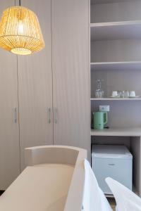 Postel nebo postele na pokoji v ubytování Mari Al Deluxe Saranda