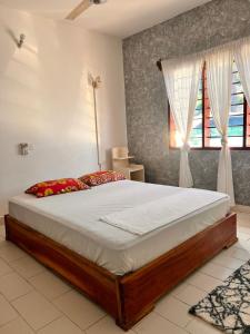 Postel nebo postele na pokoji v ubytování Honeydream Villa + 37 fotografií