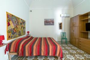Postel nebo postele na pokoji v ubytování The twins Rooms in Trapani 1