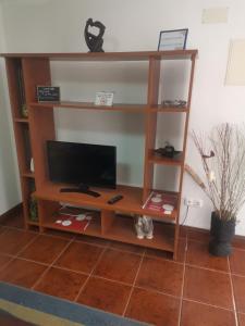 TV a/nebo společenská místnost v ubytování Casa mãe + 11 fotografií